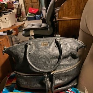 This is a Dooney ad Burke lg satchel. Black pebble leather.Excellent condition
